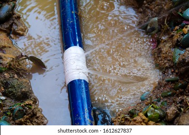 Residential Water Pipe Break And Repair With White Tape.