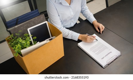 Resignation Concept, Female Employee Sign Resignation Letter Before Sending To Boss When Quit Job.