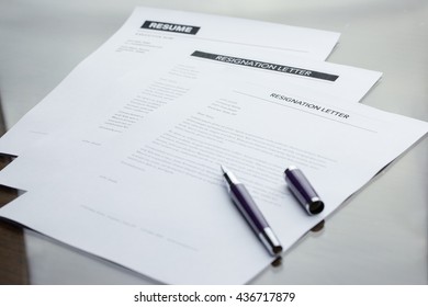 Resignation letter and Resume information with pen. - Shutterstock ID 436717879