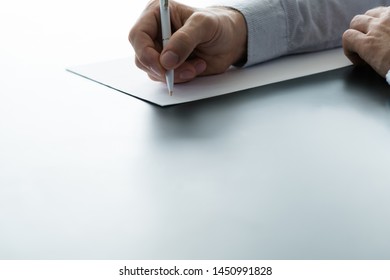 Resignation Notice. Cropped Shot Of Male Employee Quitting Job, Writing Formal Letter. Copy Space.