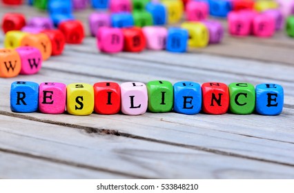 Resilience word on wooden table
