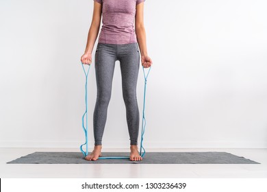 Resistance Band Fitness At Home Woman Training With Strap With Loops For Various Exercises On Exercise Mat. Fit Girl Working Out Side Bend Ab Muscles, Bent Over Chest Rowing Pullup.