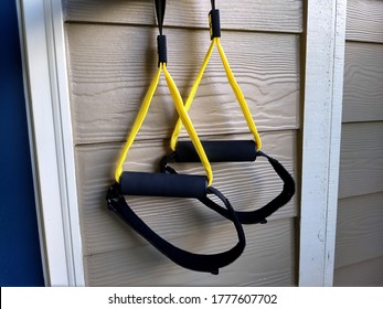 Resistance Strength Training Straps Hanging Outdoors with Closeup of Handles