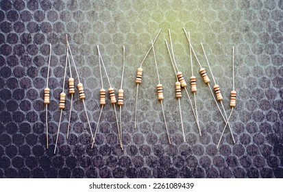 Resistors are electronic devices that control the amount of current and voltage between two points in a circuit. Soft and selective focus.                              