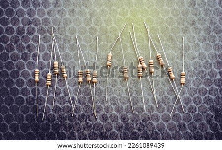 Resistors are electronic devices that control the amount of current and voltage between two points in a circuit. Soft and selective focus.                              