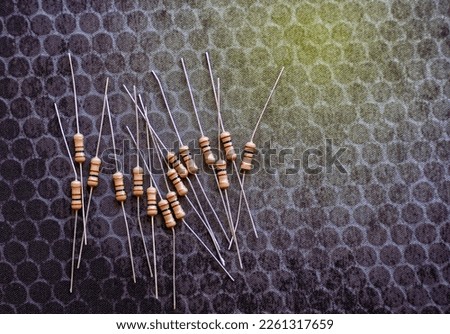 Resistors are electronic devices that control the amount of current and voltage between two points in a circuit. Soft and selective focus.                               