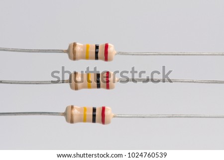 Resistors ready for auto-insertion into a printed circuit board