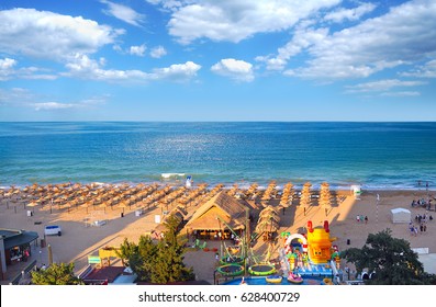 Resort Golden Sands Bulgaria panoramic top view of the beach in summer. Children's entertainment on the beach.