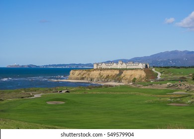Resort and golf course putting green on the cliffs by the pacific ocean, Half Moon Bay, California
