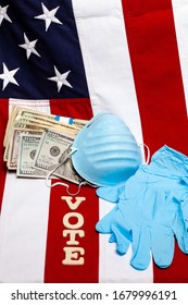 Respirator mask with cash money, gloves and the words vote in front of the american flag, vertical