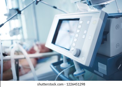 Respiratory equipment rescue critical patient. Life support monitoring of unconscious patient in the emergency room.  - Powered by Shutterstock