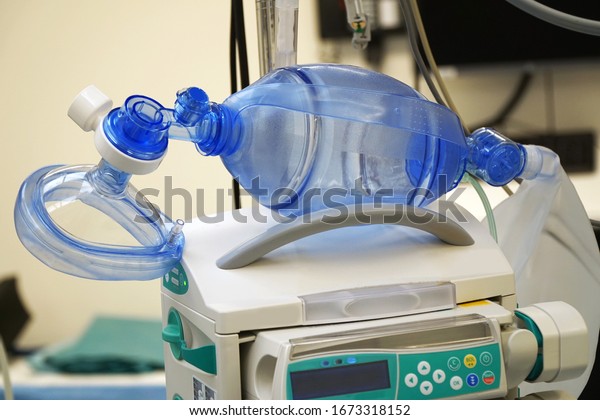 Respiratory mask with resuscitator for ventilation of a\
patient with pneumonia in the operating room of a hospital         \
                    \

