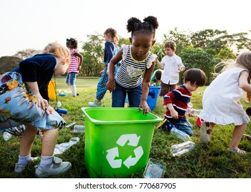 Responsible Group Of Kids Cleaning At The Park
