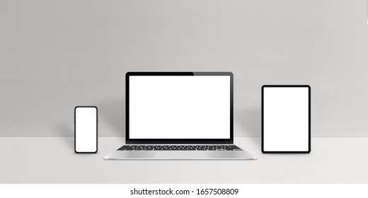 Responsive Display Devices Mockup. Smart Phone, Laptop Computer And Tablet With Round Edges. Web And App Design Promotion Concept