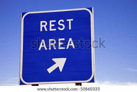 Rest area sign on the highway.
