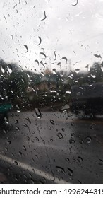 the rest of the raindrops stuck to the windshield