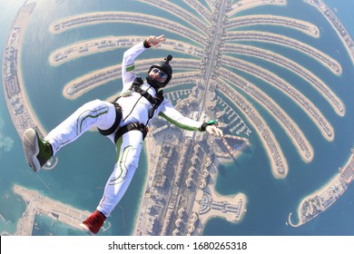 Rest tourism Jumeirah palm. Travel skydiver flying over the Islands. Beautiful views of Dubai city.Follow me.
