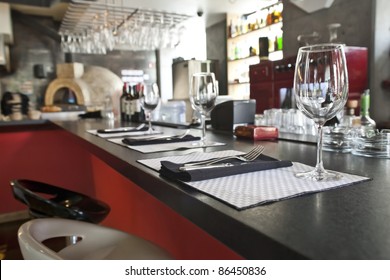 Restaurant bar with wine glasses