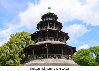 Restaurant And Beer Garden At Wooden Chinese Tower In English Garden