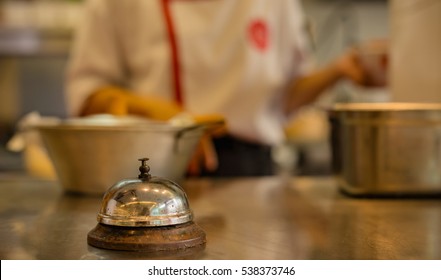 Restaurant bell vintage with blurred people background - Shutterstock ID 538373746