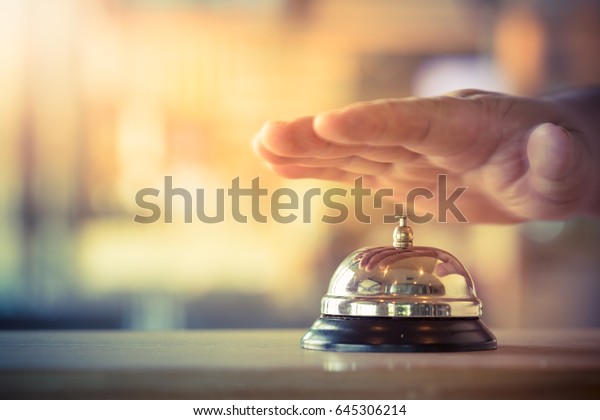 Restaurant bell vintage with hand. The bell
of a psychologist