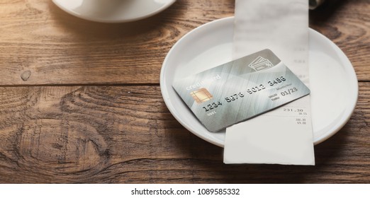 Restaurant Bill For Coffee And Credit Card On Wooden Table, Paying For Lunch At Cafe, Copy Space