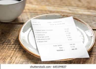 Restaurant Bill Paying By Credit Card For Coffee On Wooden Table Background