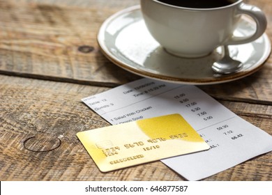 Restaurant Bill Paying By Credit Card For Coffee On Wooden Table Background