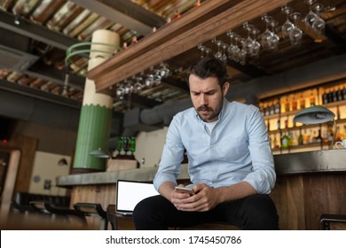 Restaurant, Cafe, Bar Closed Due To COVID-19 Or Coronavirus Outbreak Lockdown, Stressed Owner Of Small Business, Depression. Businessman Exhausted, Upset. Business, Economy, Finance Crisis.