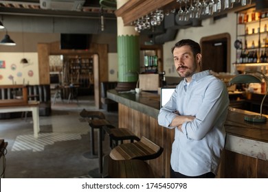 Restaurant, Cafe, Bar Closed Due To COVID-19 Or Coronavirus Outbreak Lockdown, Stressed Owner Of Small Business, Depression. Businessman Exhausted, Upset. Business, Economy, Finance Crisis.