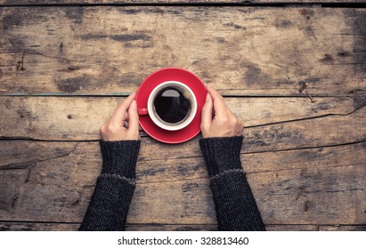 Restaurant or cafe breakfast menu background. Woman's hand holding cup of coffee. 