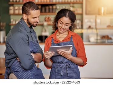 Restaurant, cafe teamwork and couple with tablet to manage orders, inventory and stock check. Diversity, waiter technology and man and woman with digital touchscreen for managing sales in coffee shop - Powered by Shutterstock