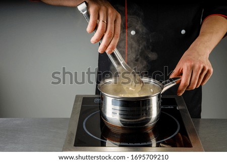 
restaurant chef cooking noodles for website and menu2