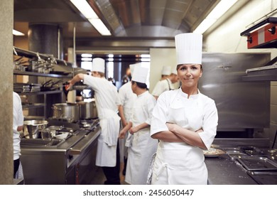 Restaurant, chef and portrait of woman with arms crossed for culinary service, job and pride in kitchen. Fine dining, person and face of cook in food industry for catering, career and hospitality - Powered by Shutterstock