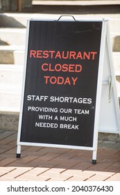 A Restaurant Closed Due To Staff Shortage Sign.  Businesses Continue To Struggle With Staff Shortages During The Covid 19 Pandemic.