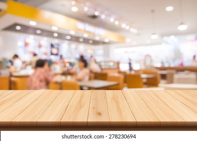 Restaurant And Coffee Shop Blurred Background With Bokeh And Wooden Floor