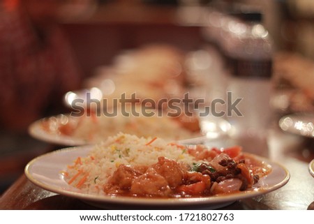 Restaurant Food Platter containing rice, pron curry, vegetable. Iftar meal