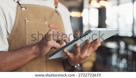 Restaurant, hands or waiter scroll with tablet, table management or browsing online service platform. Check reservation, view menu specials or person with tech for info, bistro app or order status