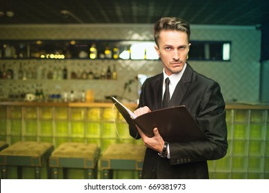 The Restaurant Manager Suspiciously 