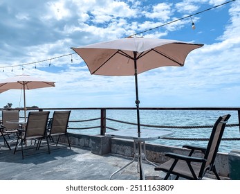 restaurant outdoor besides the beach, beachfront cafe. - Powered by Shutterstock