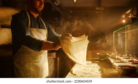 In Restaurant Professional Chef Preparing Pizza, Kneading Dough, Spinning and Tossing it, Traditional Family Recipe. Authentic Sunny Pizzeria, Cooking Delicious Organic Food. Shot - Shutterstock ID 2230654559