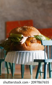 Restaurant Scene Forced Perspective Larger Than Life Giant Cheeseburger Shot With Miniature Doll Furniture