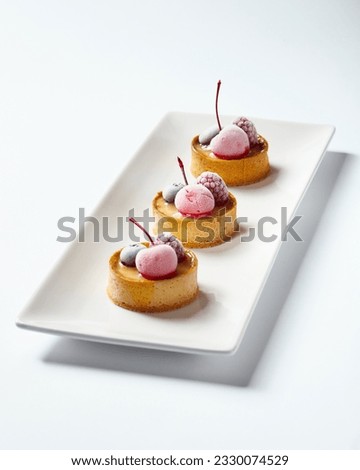 Similar – Image, Stock Photo Frozen cherries and raspberries in cherry red and raspberry red for the delicious fruit cake in Wettenberg Krofdorf-Gleiberg near Giessen in Hesse