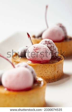 Similar – Image, Stock Photo Frozen cherries and raspberries in cherry red and raspberry red for the delicious fruit cake in Wettenberg Krofdorf-Gleiberg near Giessen in Hesse