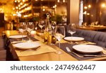 In a restaurant setting, a luxurious dinner meet immerses viewers in the cozy ambiance of a bustling luxury restaurant. Background with blurred flowers and candles 