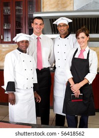 Restaurant Staff Inside Industrial Kitchen