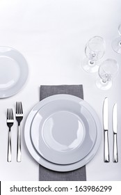 Restaurant Table Set With Grey Napkin