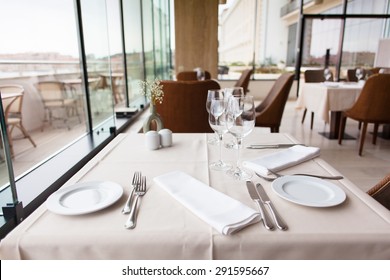 Restaurant Table Setting By The Window