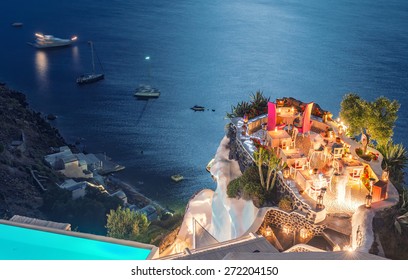 Restaurant terrace over the ocean at night. Luxury and holiday concept.