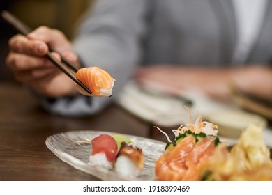 Restaurant using chopsticks for eating sushi